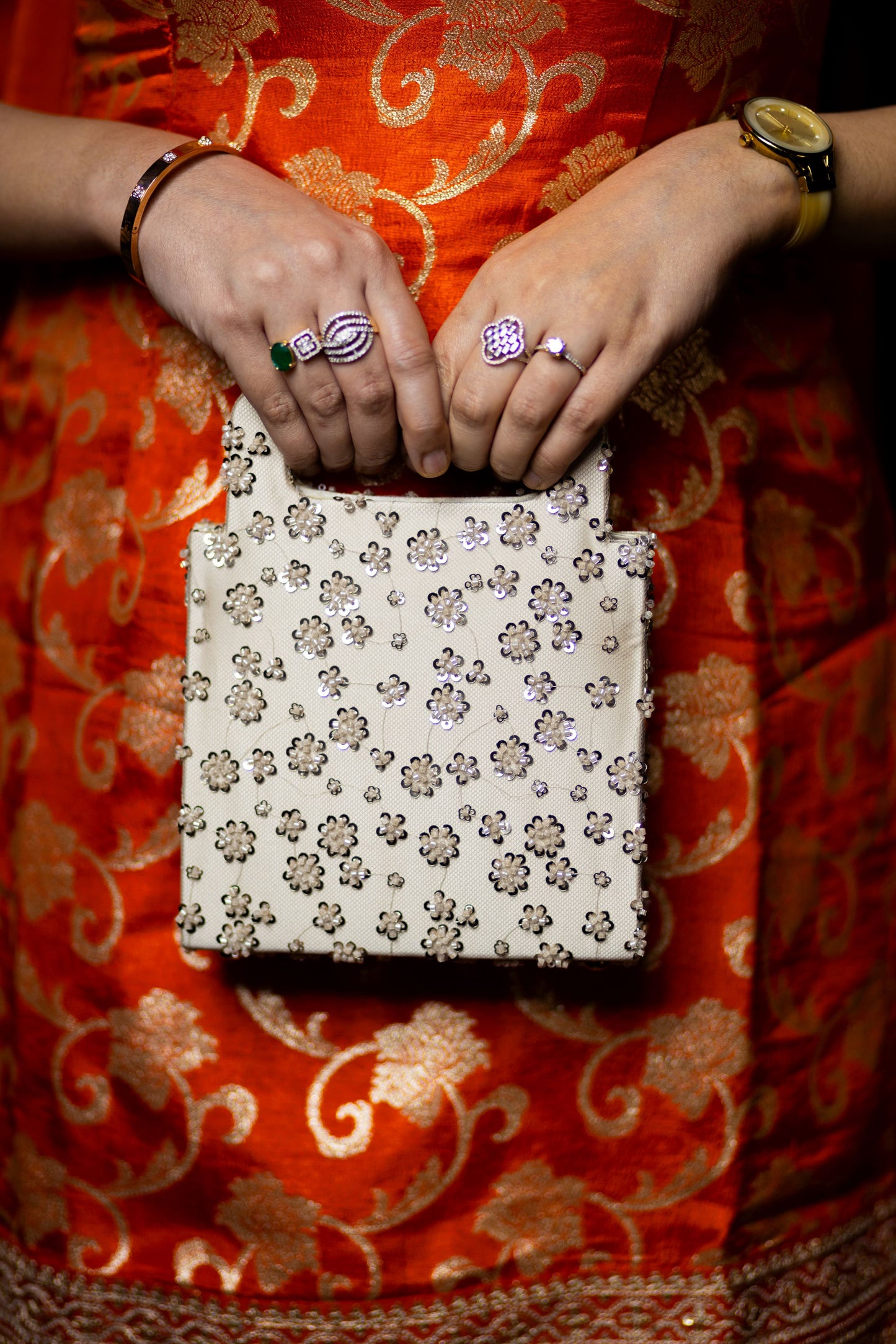 Infuse your festive look with a touch of Indian opulence through our diverse range of wedding purses. You can carry this beautiful hand-held purse for your special occasions!
Though its a hand-held clutch design, we have provided a beautiful crystal encrusted belt to make it convenient and handsfree when you want to
Material : Hand embroidered floral net
Size
Big : 7.5 × 9 x 2.5 inches
Small : 6.5 × 8.5 × 2.5 inches
Inclusions
crystal encrusted belt
magnetic lock
