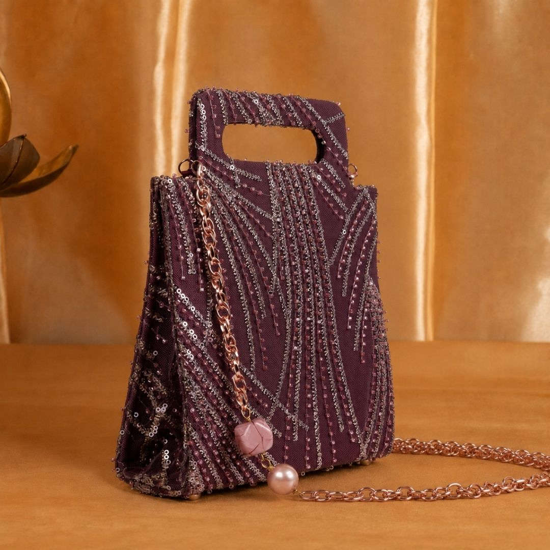Hand-held Wine colored clutch