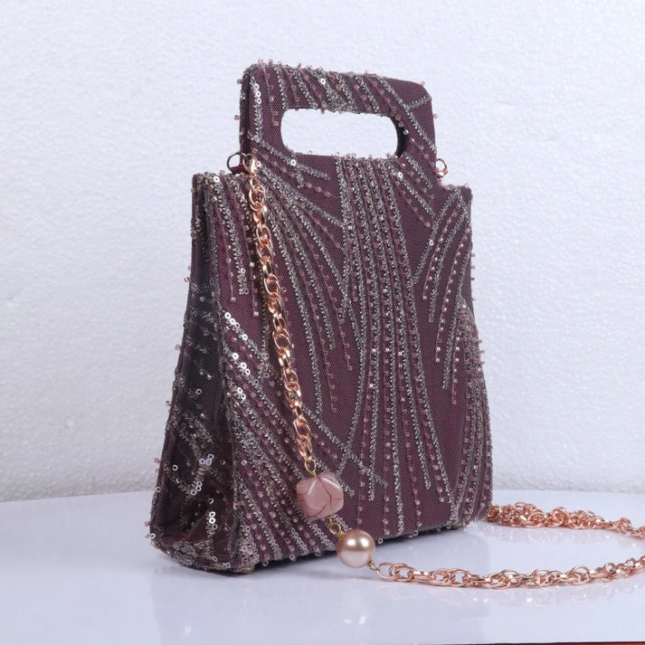 Hand-held Wine colored clutch