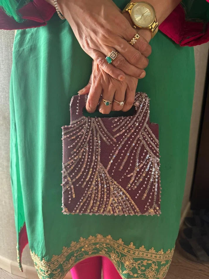 Hand-held Wine colored clutch